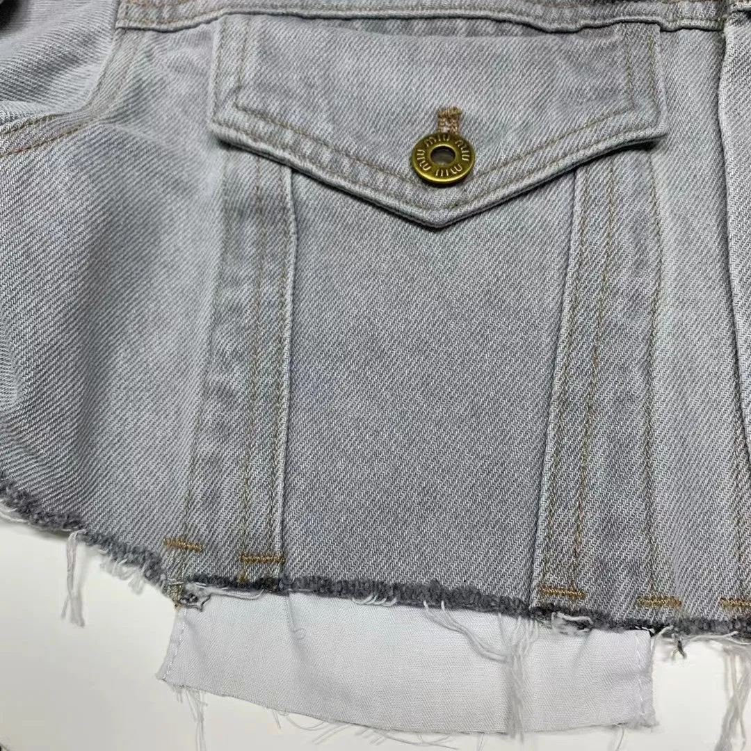 Light-colored denim jacket and rhinestone A-line skirt suit
